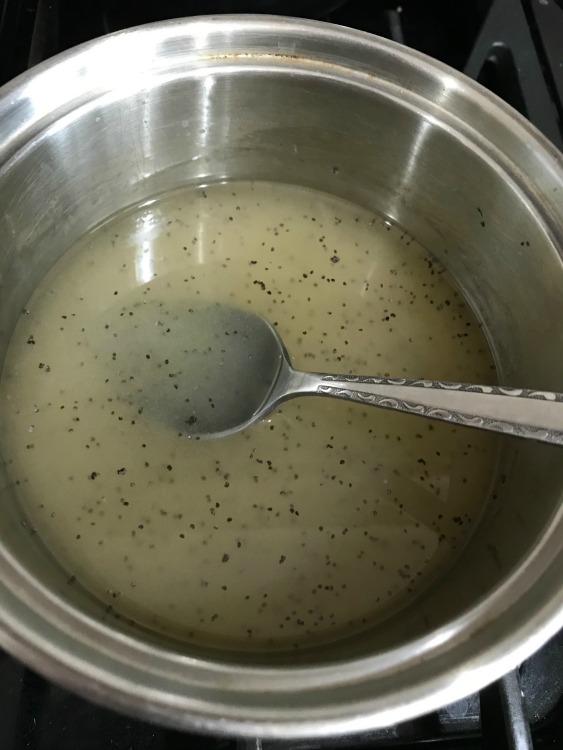 Poppy seed dressing in saucepan