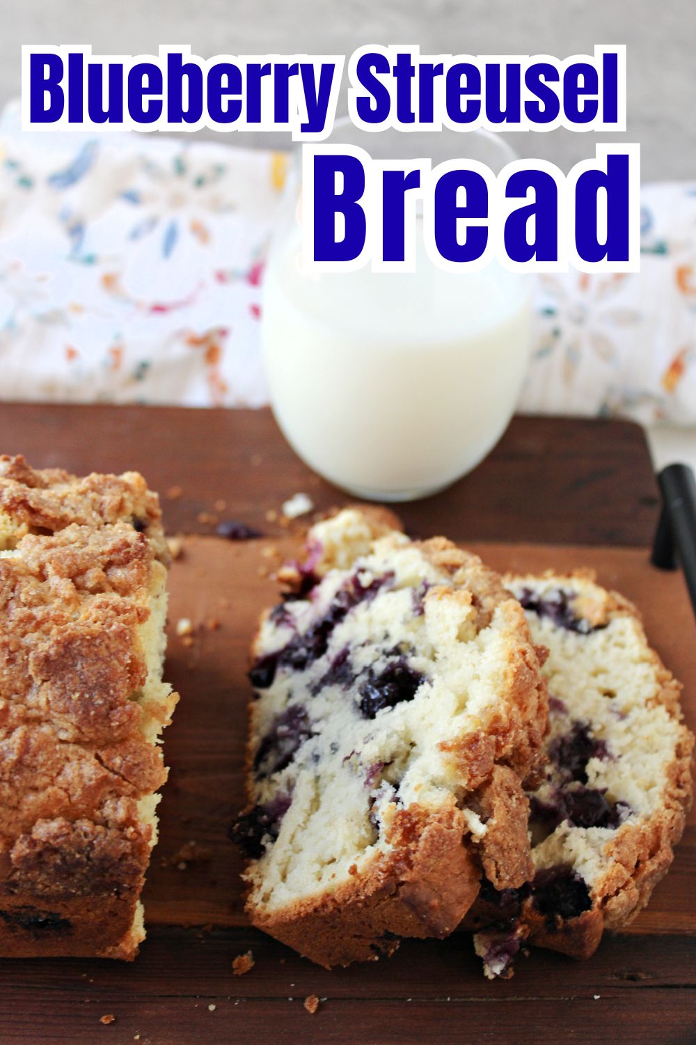 blueberry streusel bread with milk behind. 