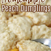 Peach Dumplings in a skillet with a spoon.