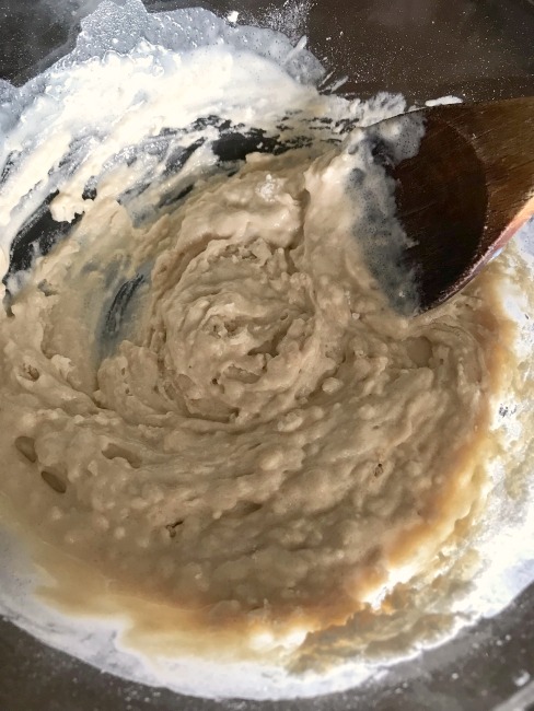 Blueberry cobbler dough in a mixing bowl