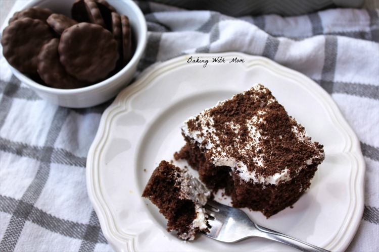 Grasshopper Poke Cake with mint cookies in a bowl