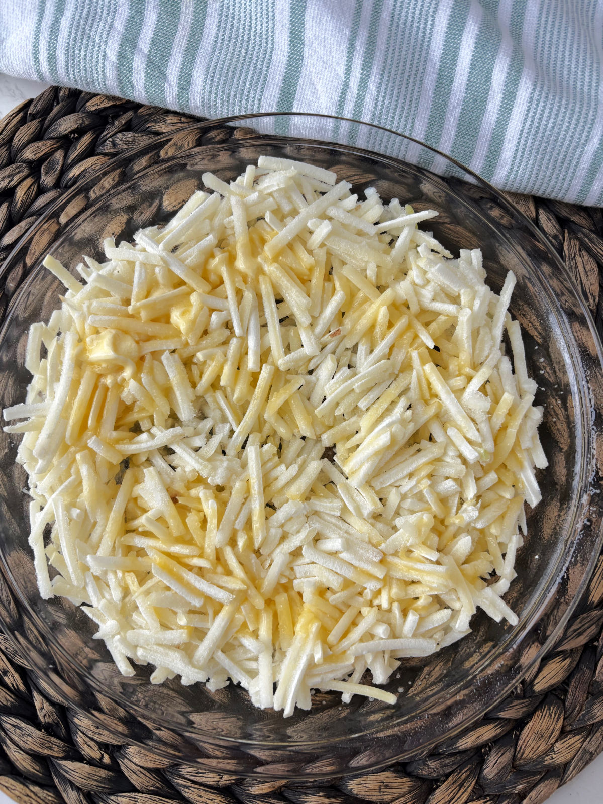 frozen hashbrowns in a pie pan.