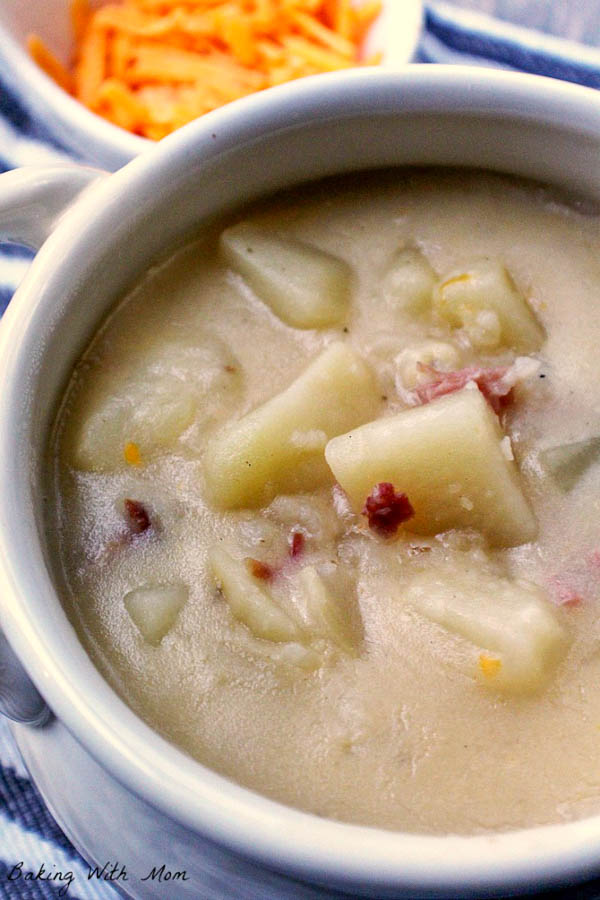 Dairy Free Potato Soup in a small bowl with ham pieces 