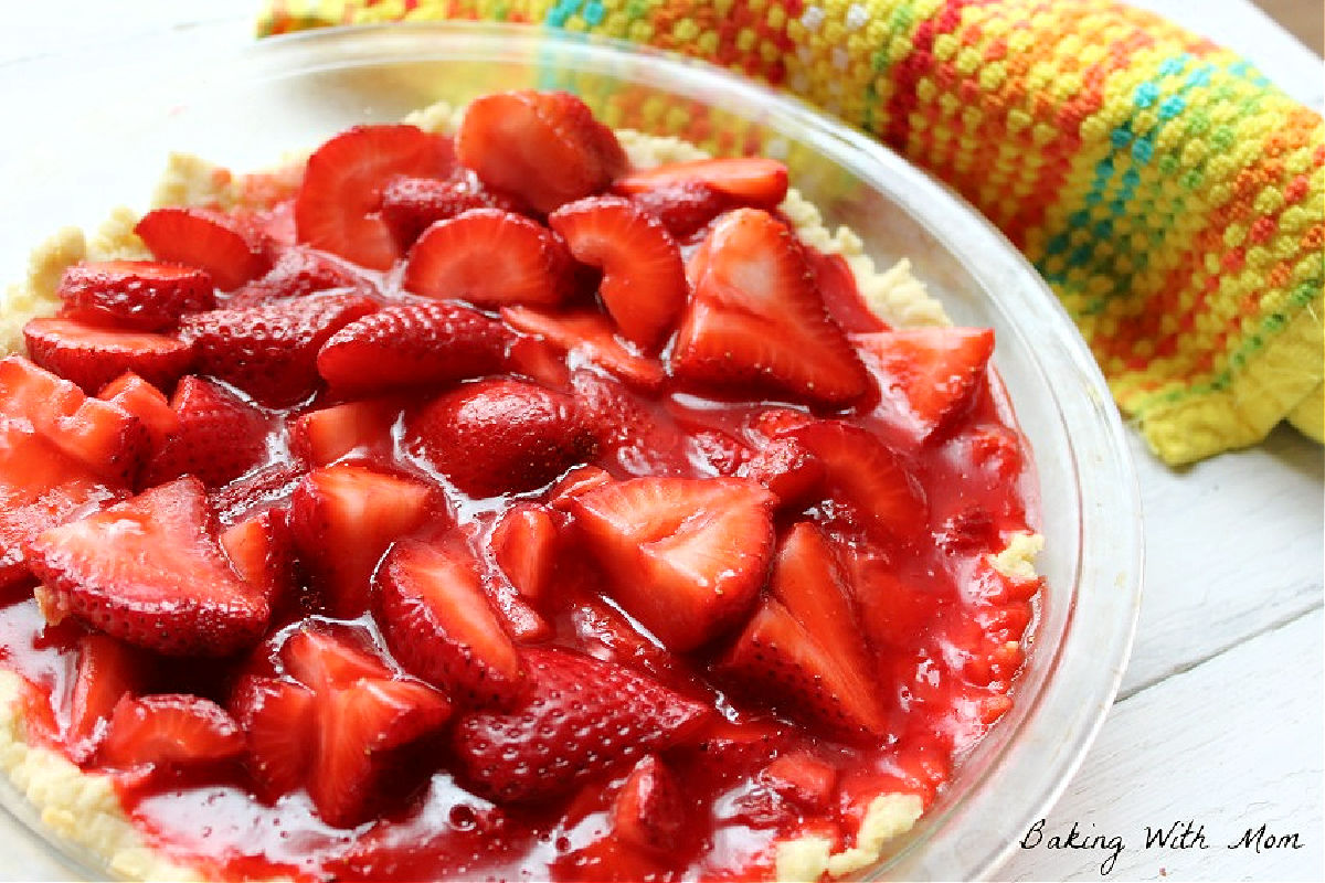 strawberry pie in a pie pan. 