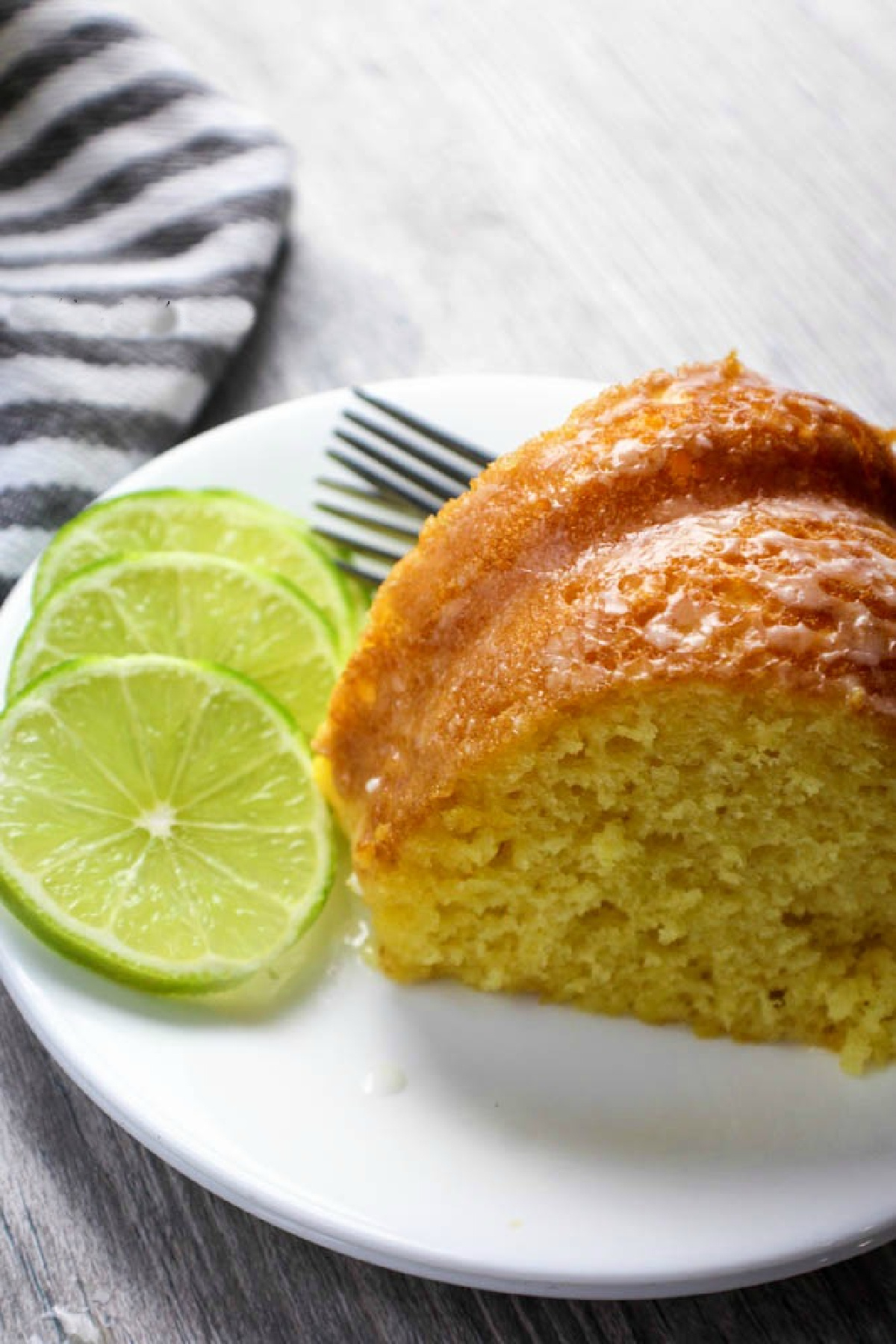 key lime cake on a white plate.