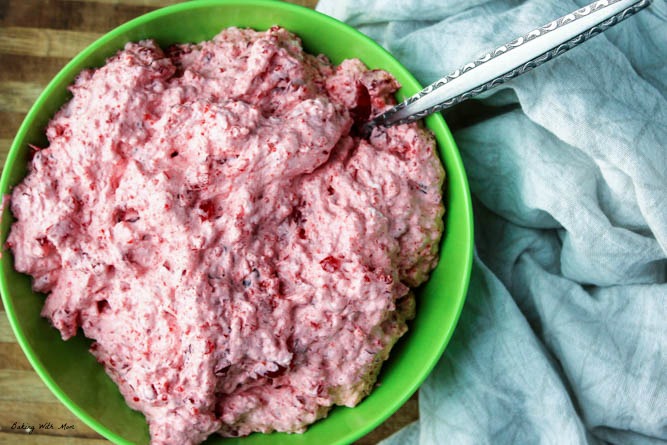 Cherry Lemonade Salad in a bowl on a cutting board