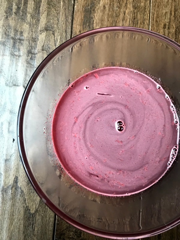 Liquid Jello in a clear bowl