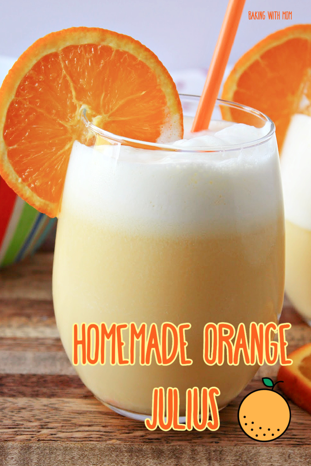 Homemade Orange Julius Recipe with an orange slice and straw. 