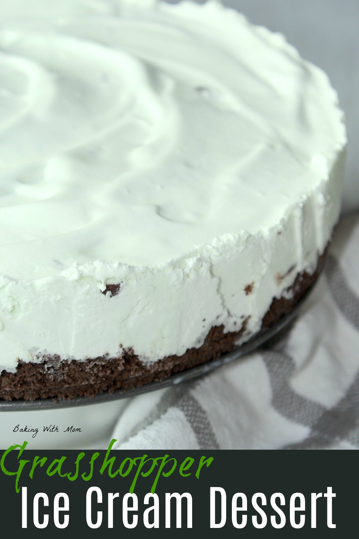 mint ice cream with cookie crust and a white towel laying besides