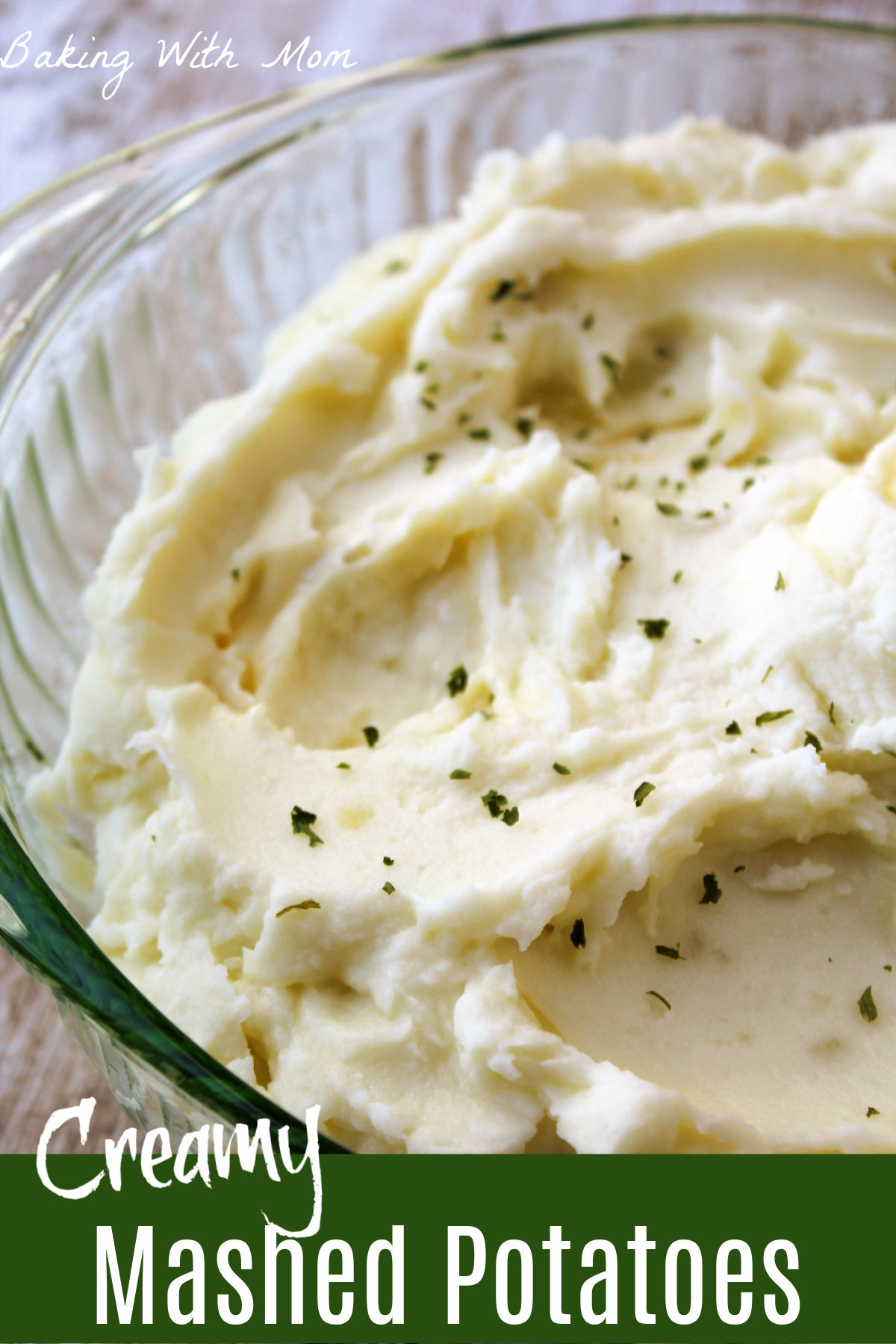 bowl of mashed potatoes with parsley flakes 