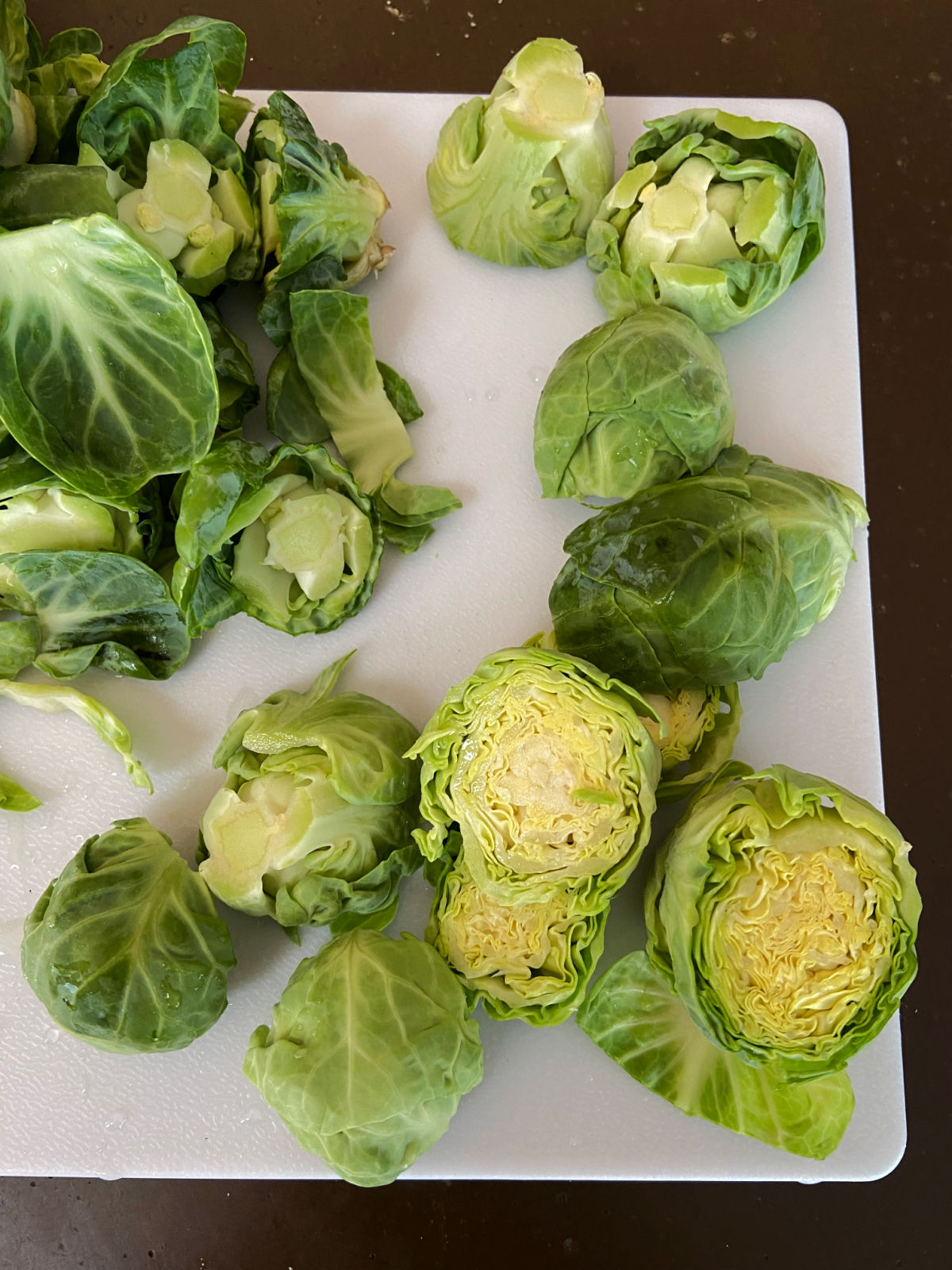 Brussel Sprouts on a cutting tray.