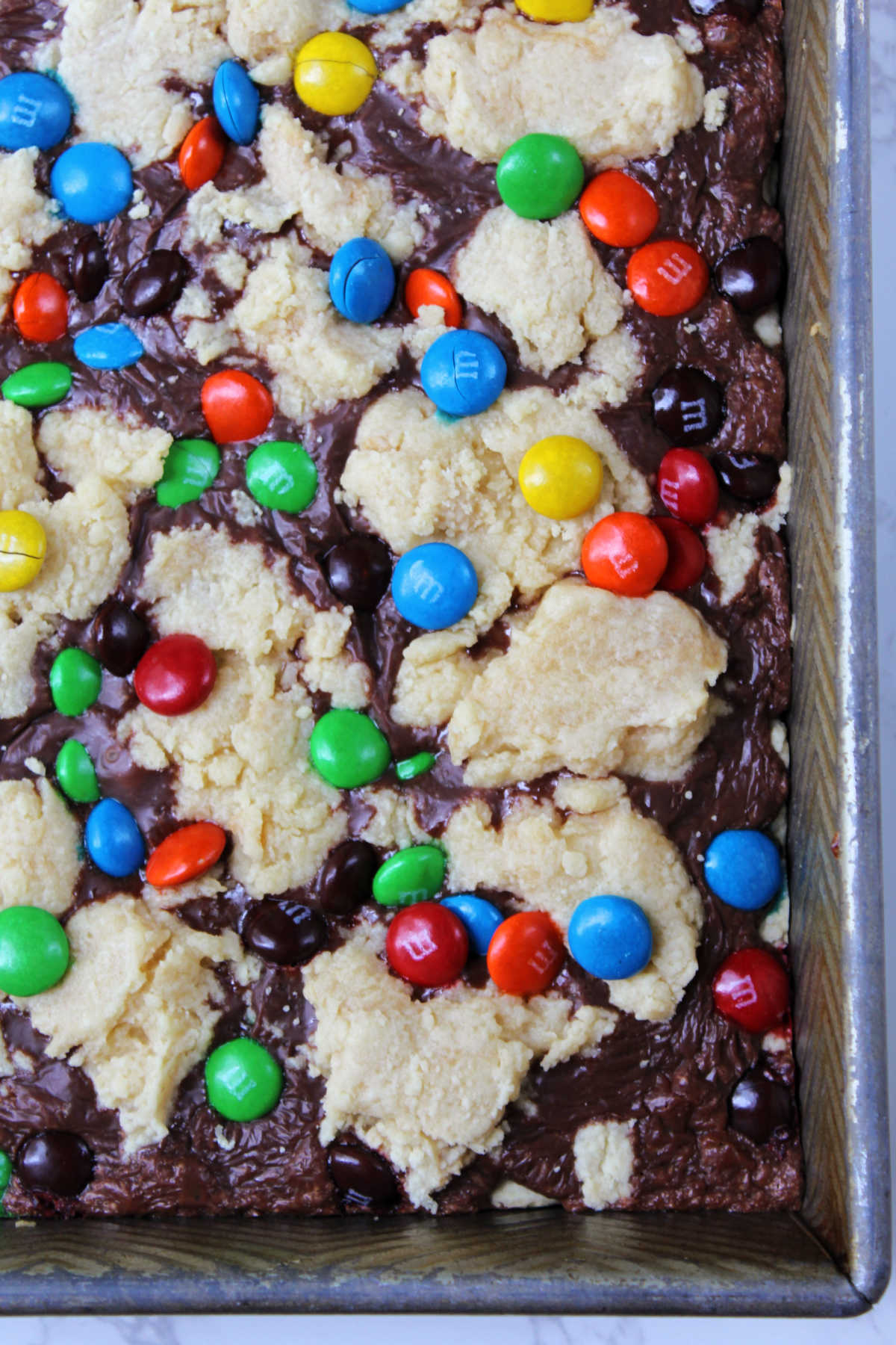 Shortbread bars with M&M's and chocolate on top. 
