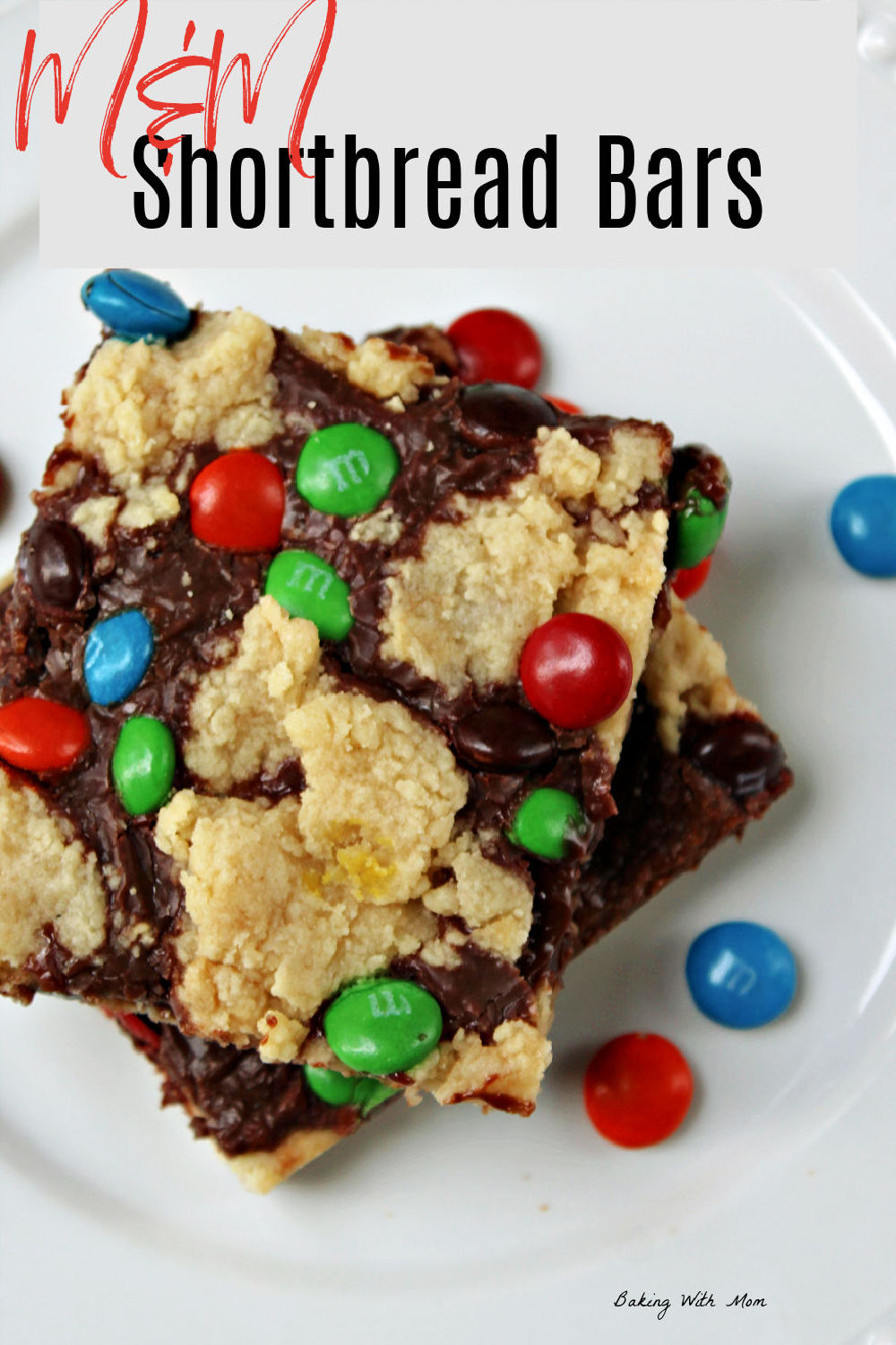 two shortbread cookie bars stacked on a white plate. 