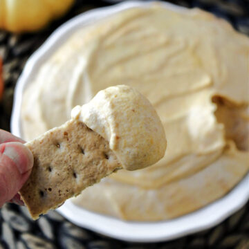 pumpkin pie dip on a graham cracker.