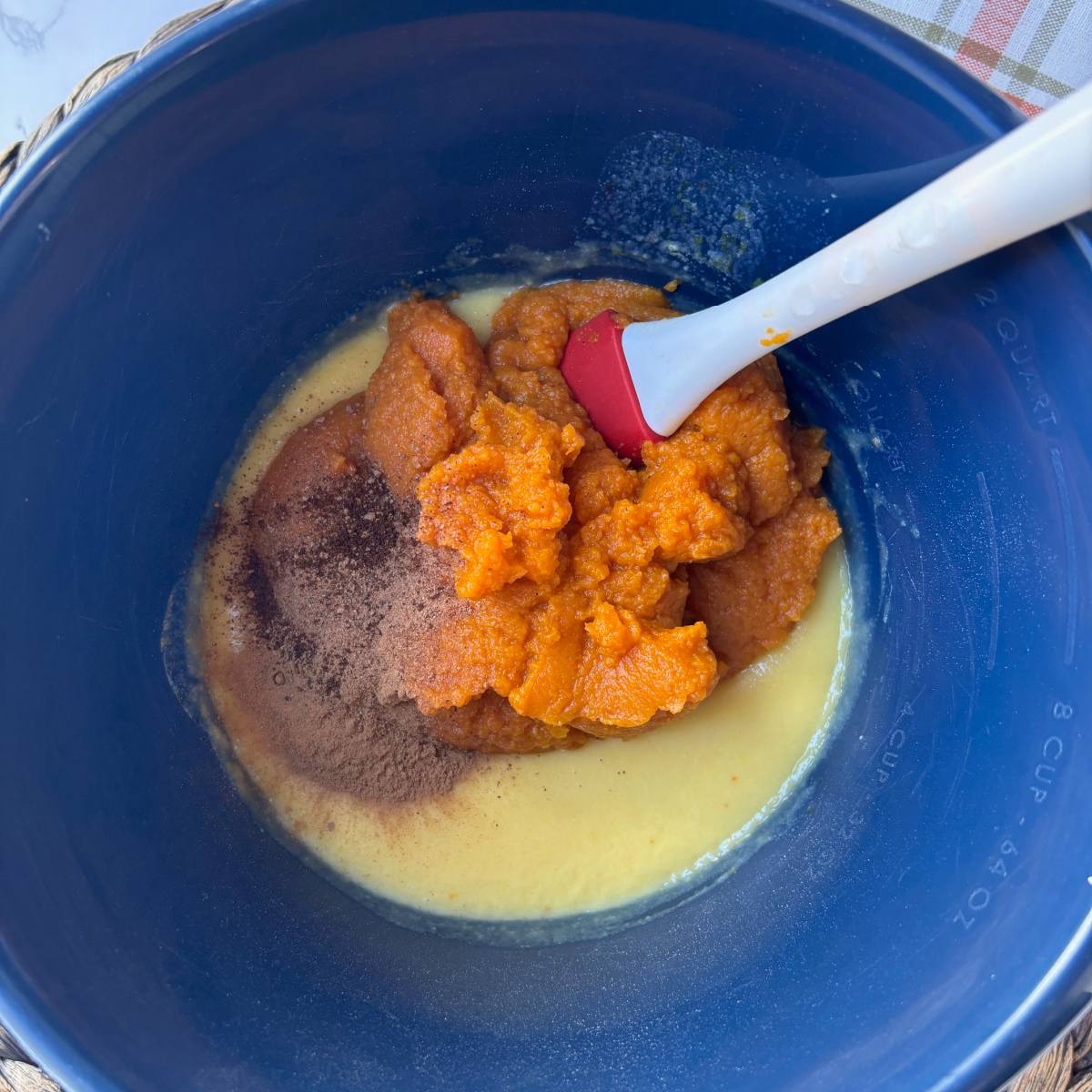 pudding and pumpkin in a blue bowl.