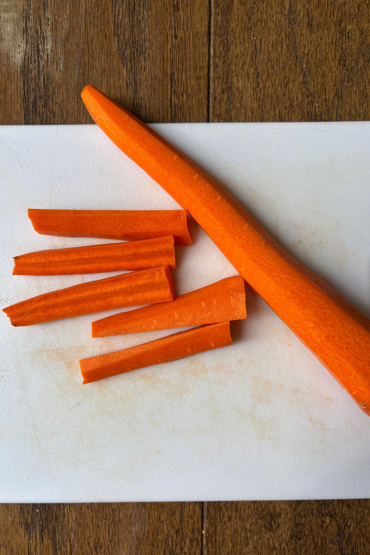 Carrots on a cutting board.