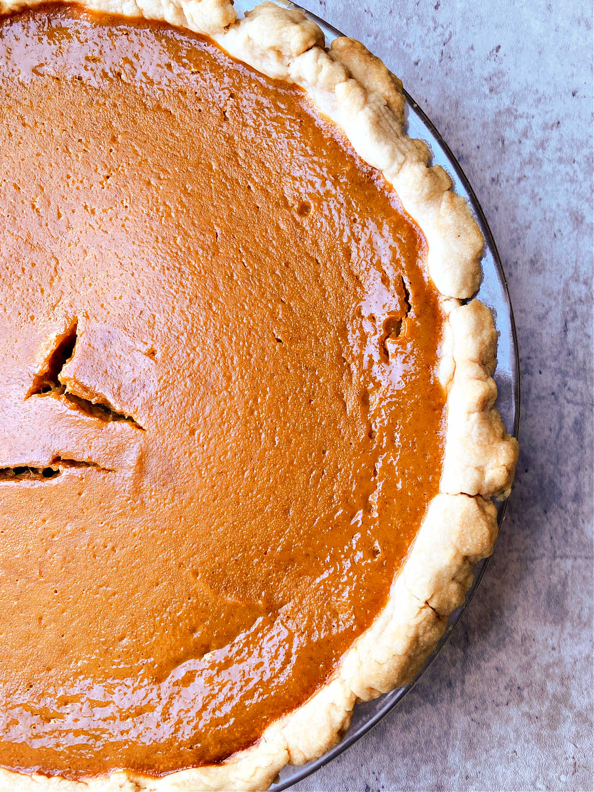 Pumpkin pie in a baked pie crust.