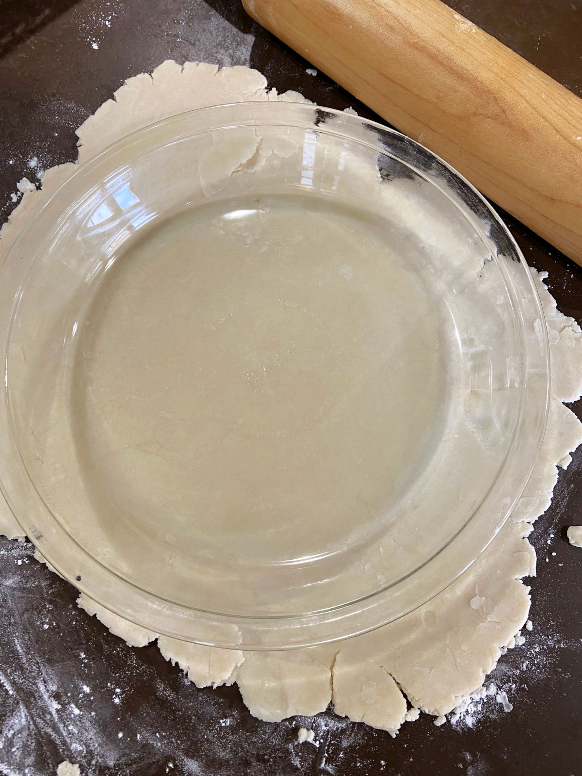 pie crust with a pie plate on top. 