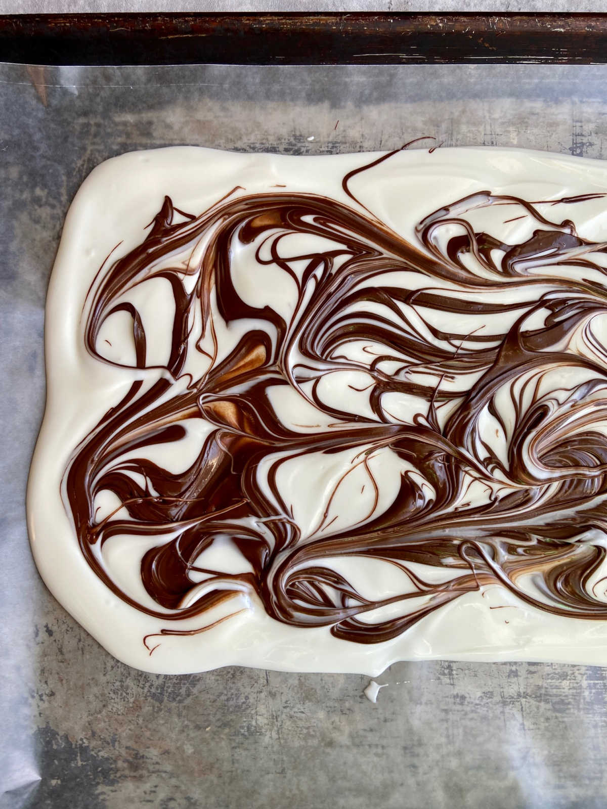 Chocolate swirl in vanilla almond bark.