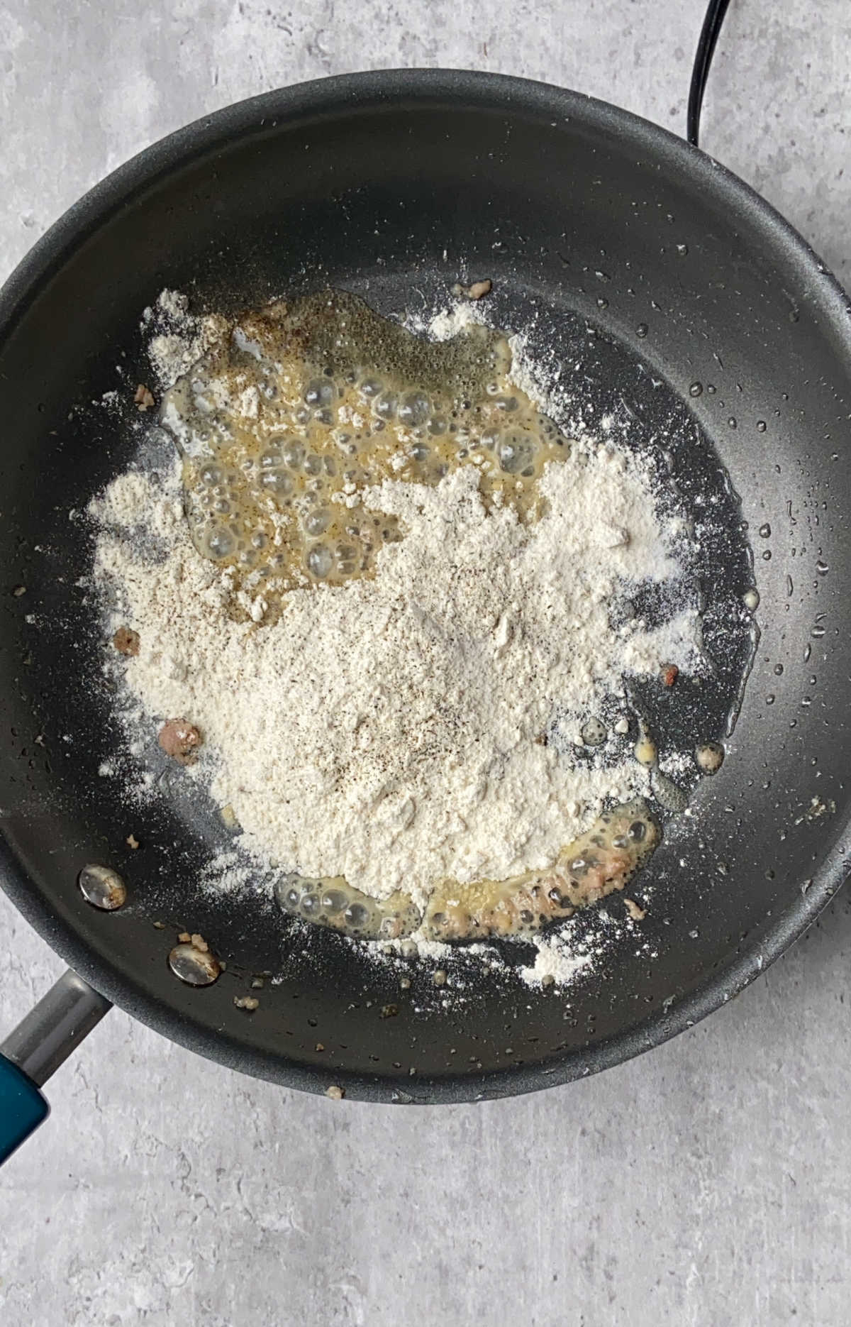 Flour and grease in a frying pan. 