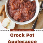 Crock pot applesauce with apples and cinnamon sticks besides.