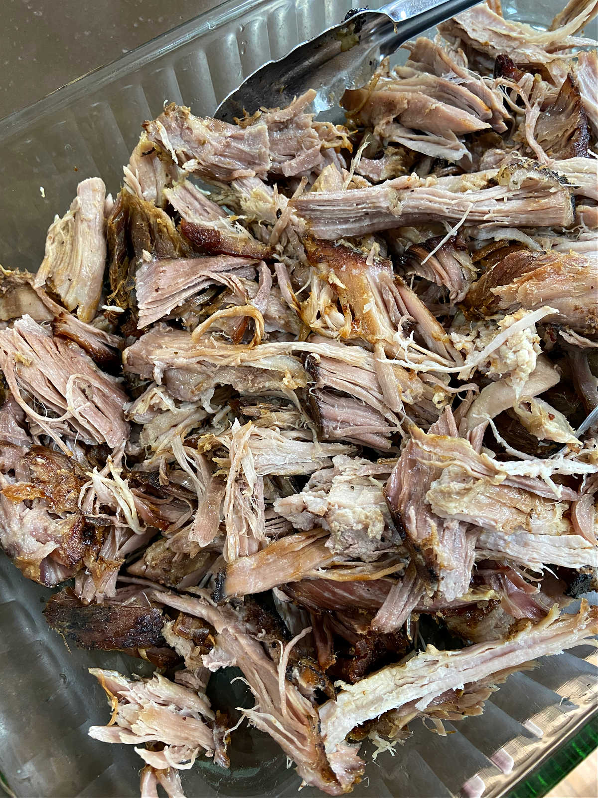 shredded pork in a baking dish. 