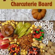 fall charcuterie board with pretzels, apples, pears.