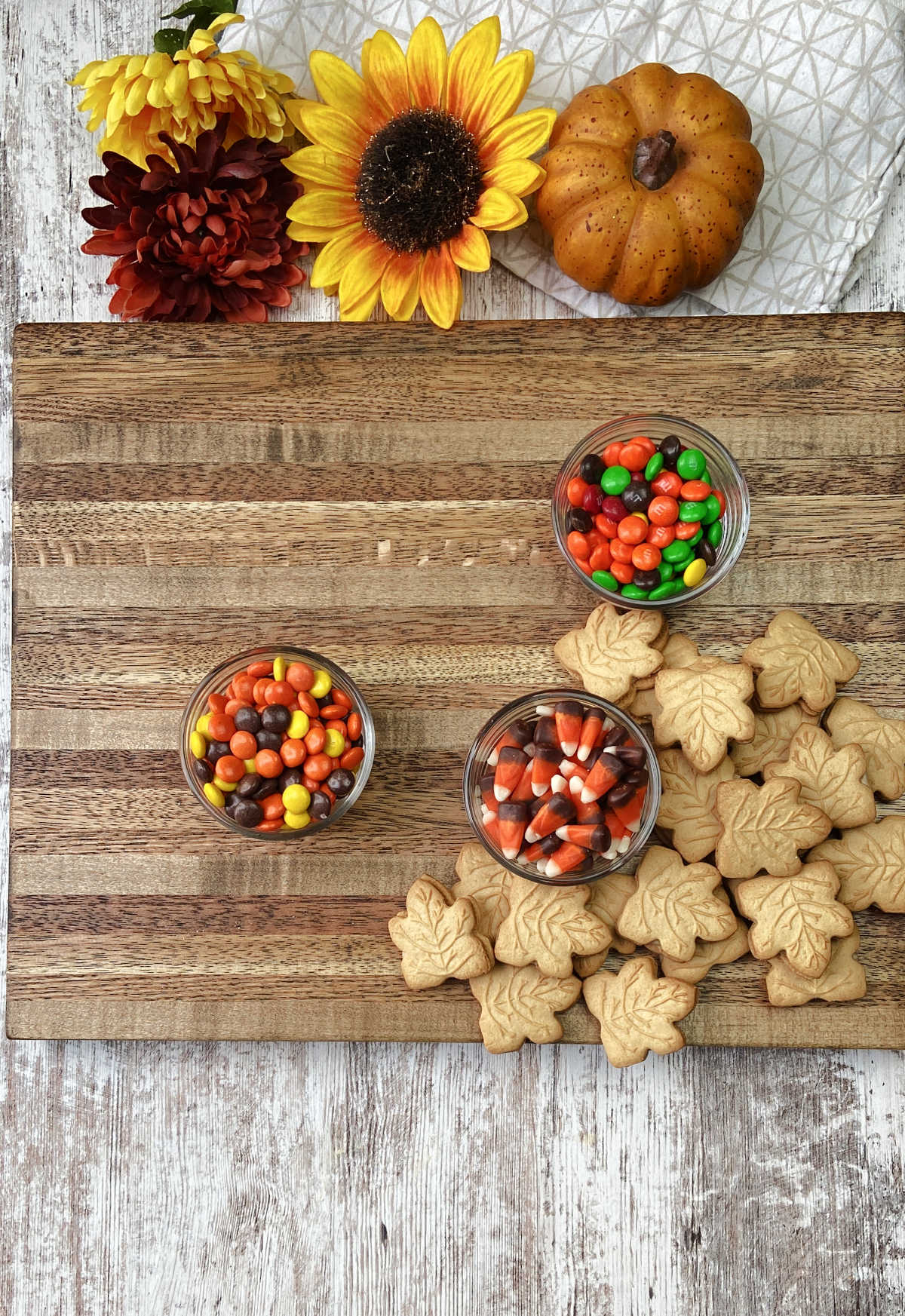 maple cookies on a brown board.