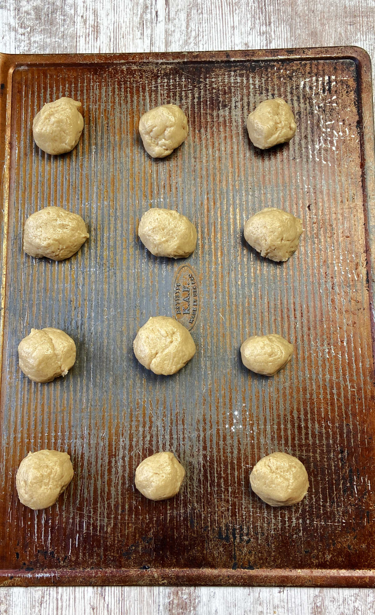 cookie dough on a baking sheet.