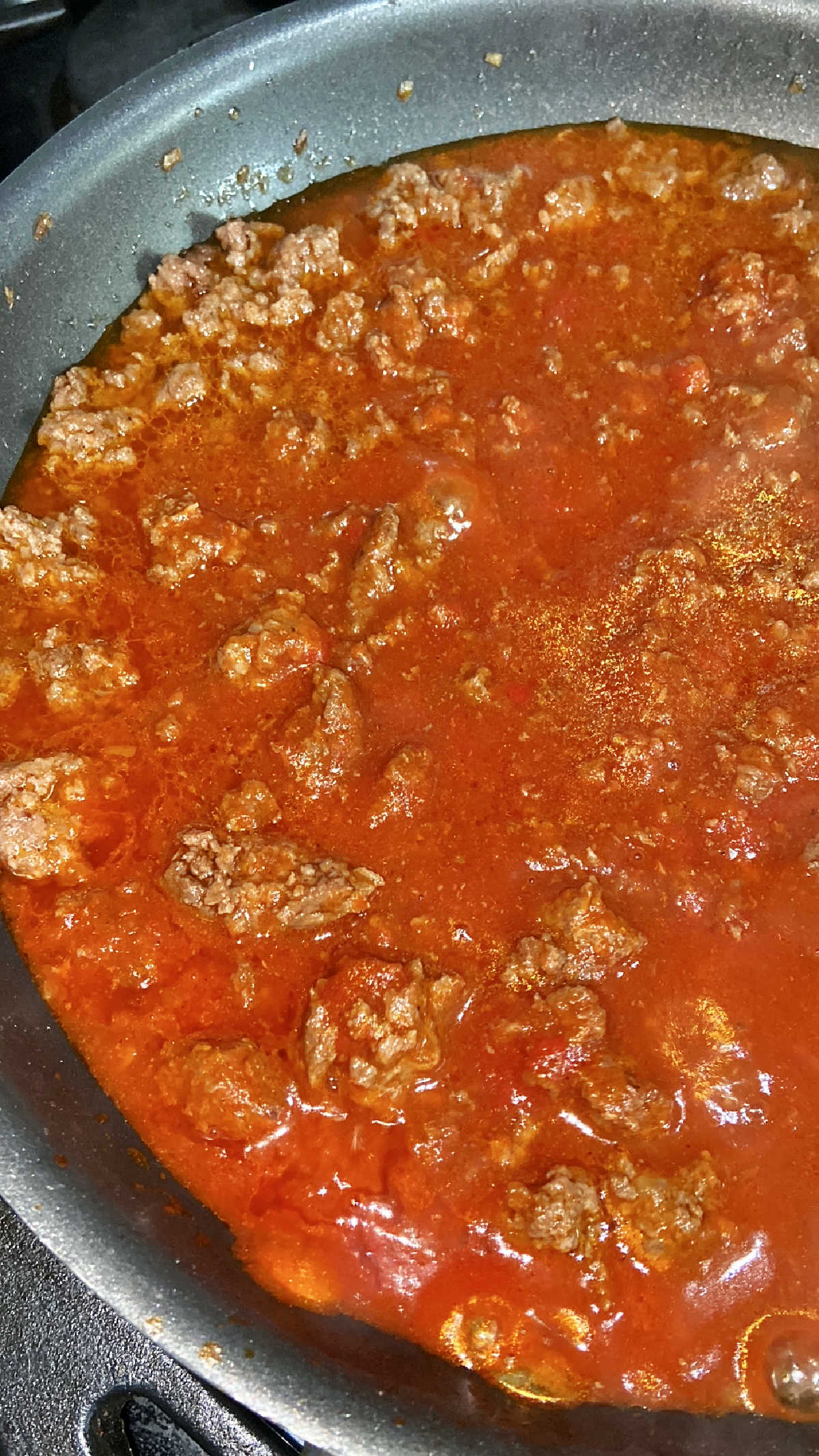 cooked tomato paste with hamburger.