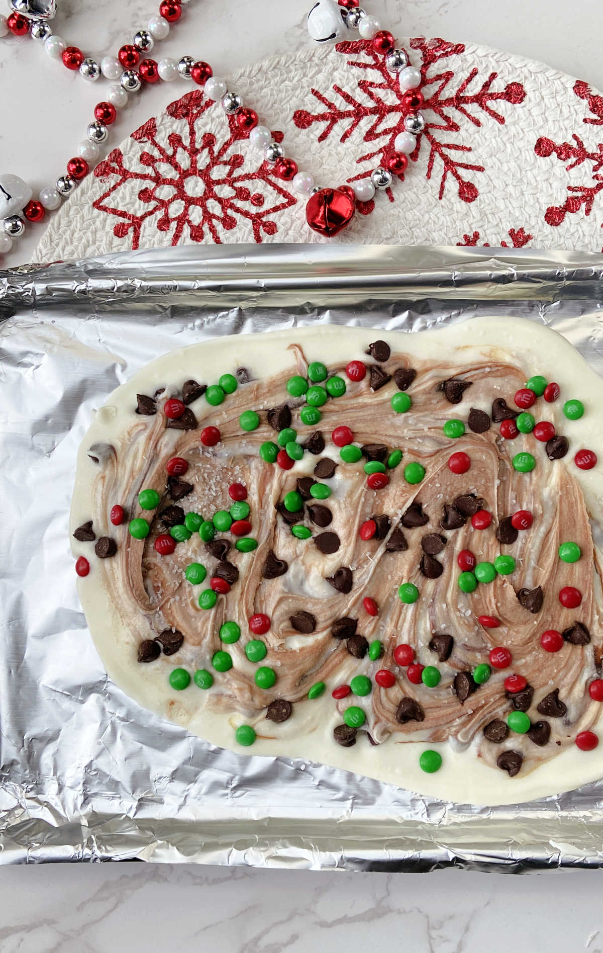 chocolate chips, mm's and almond bark on a foil lined pan. 