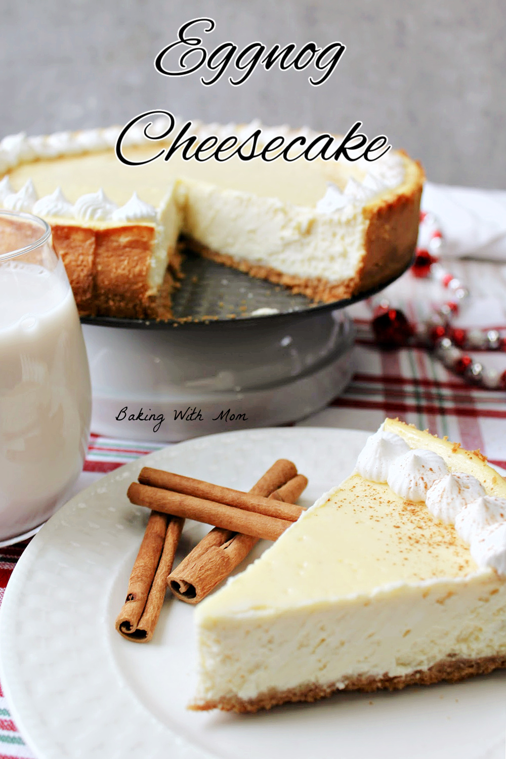 Eggnog cheesecake on a white plate with a glass of milk besides. 