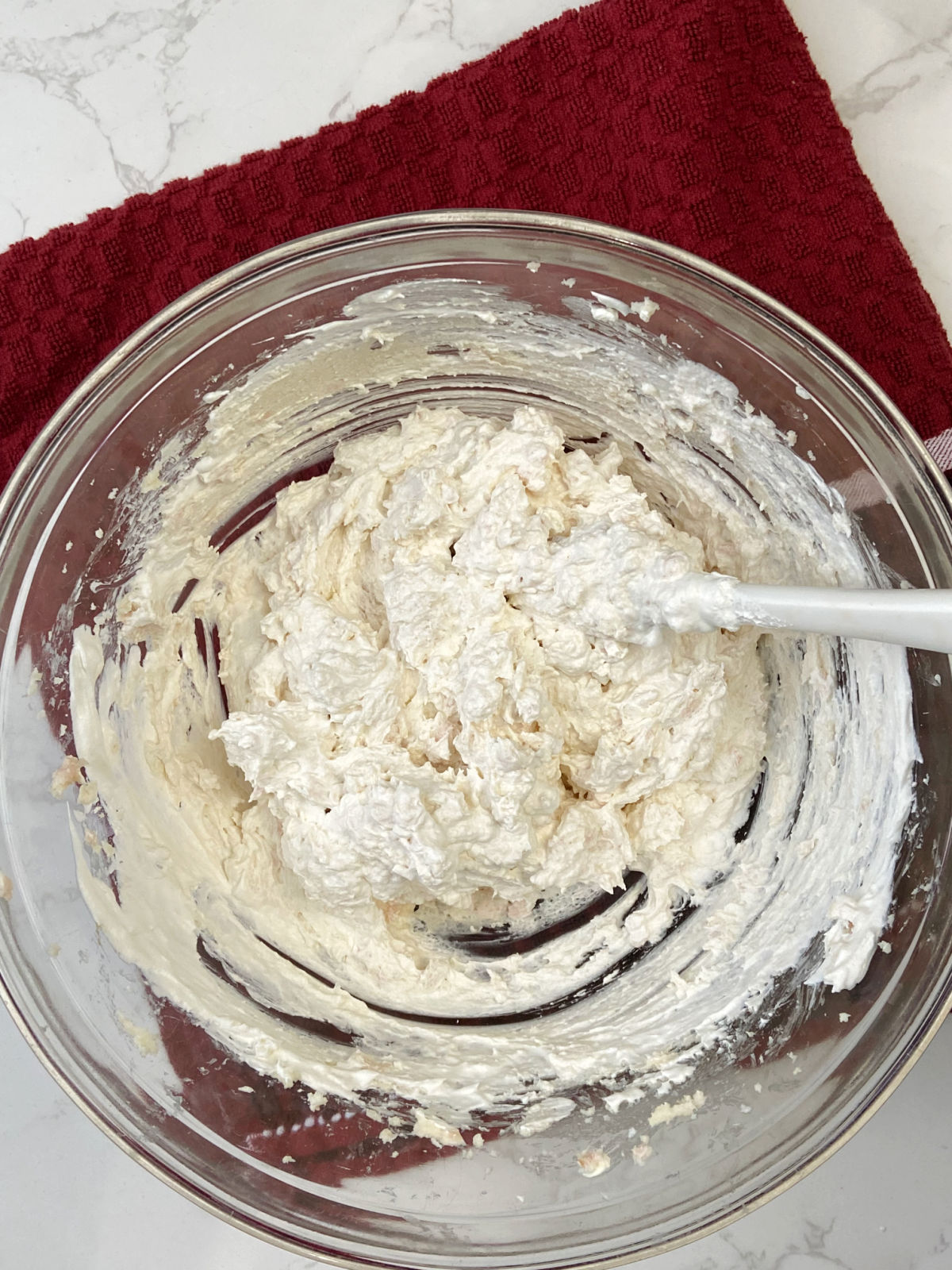 cream cheese mixture in a clear bowl. 