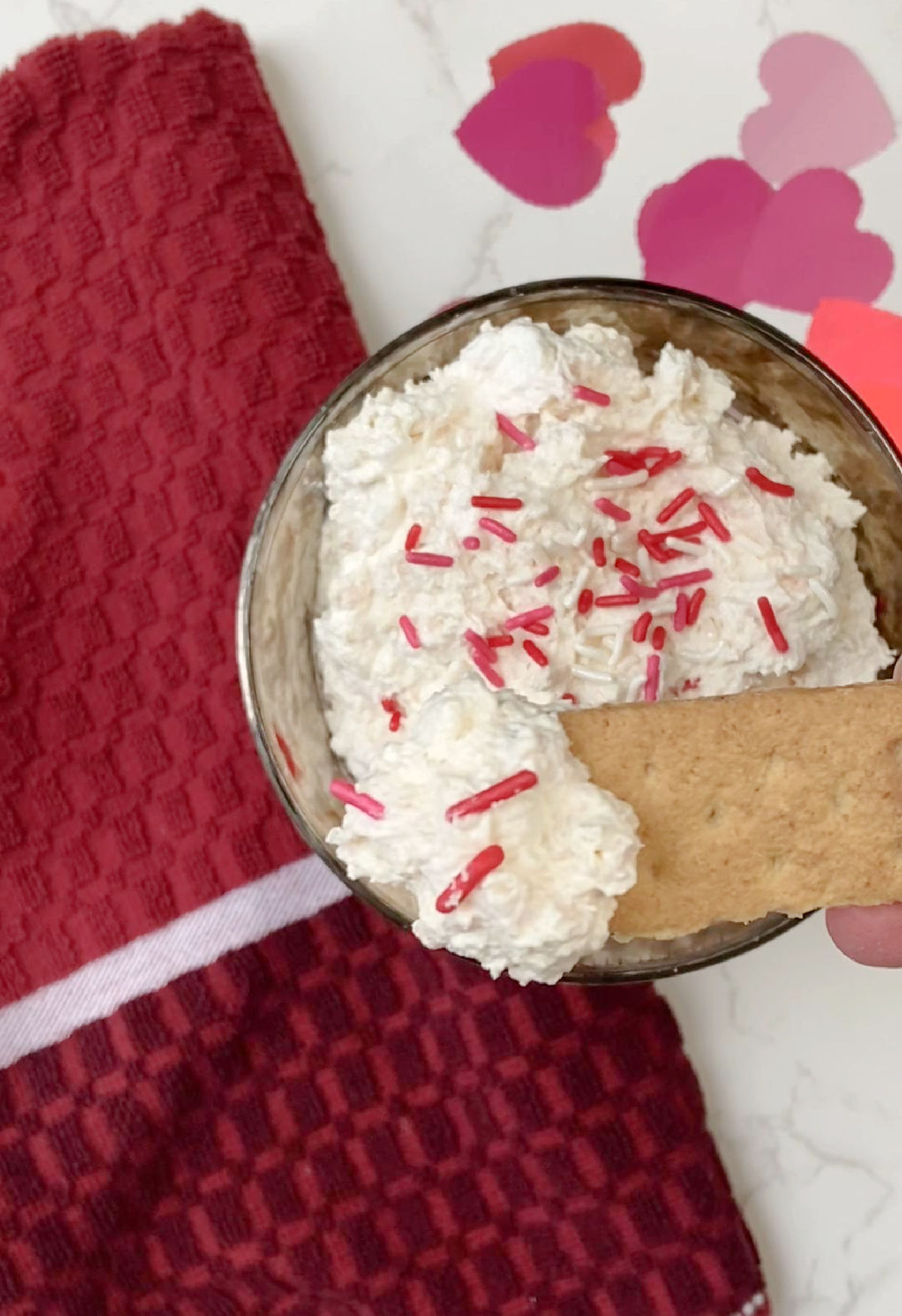 Dip in a clear bowl with a graham cracker. 