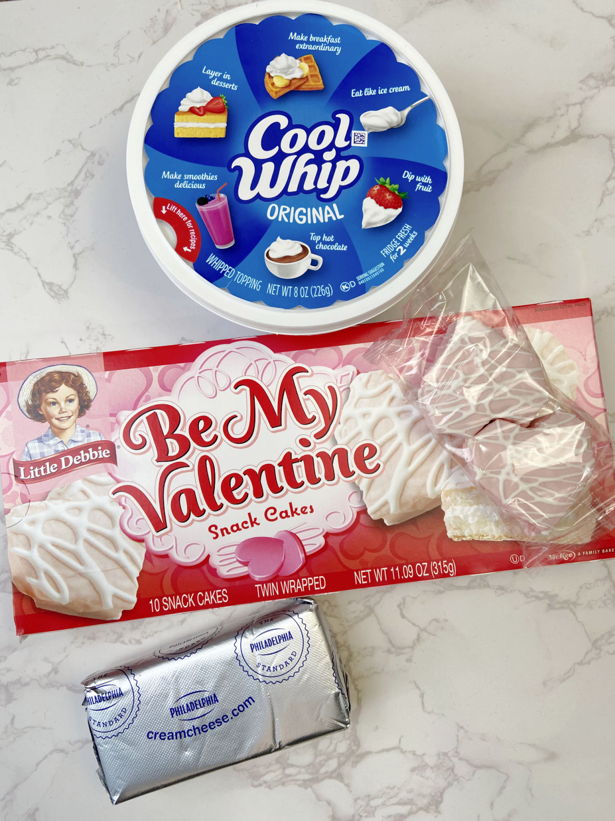 cool whip, valentine cakes and cream cheese. 