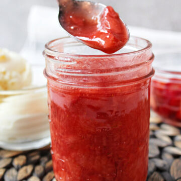 strawberry sauce with a spoon.