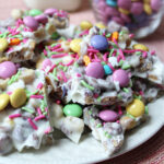 Easter bark candy on a white plate.