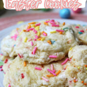 Gooey Easter cookies on a white plate with sprinkles on top.