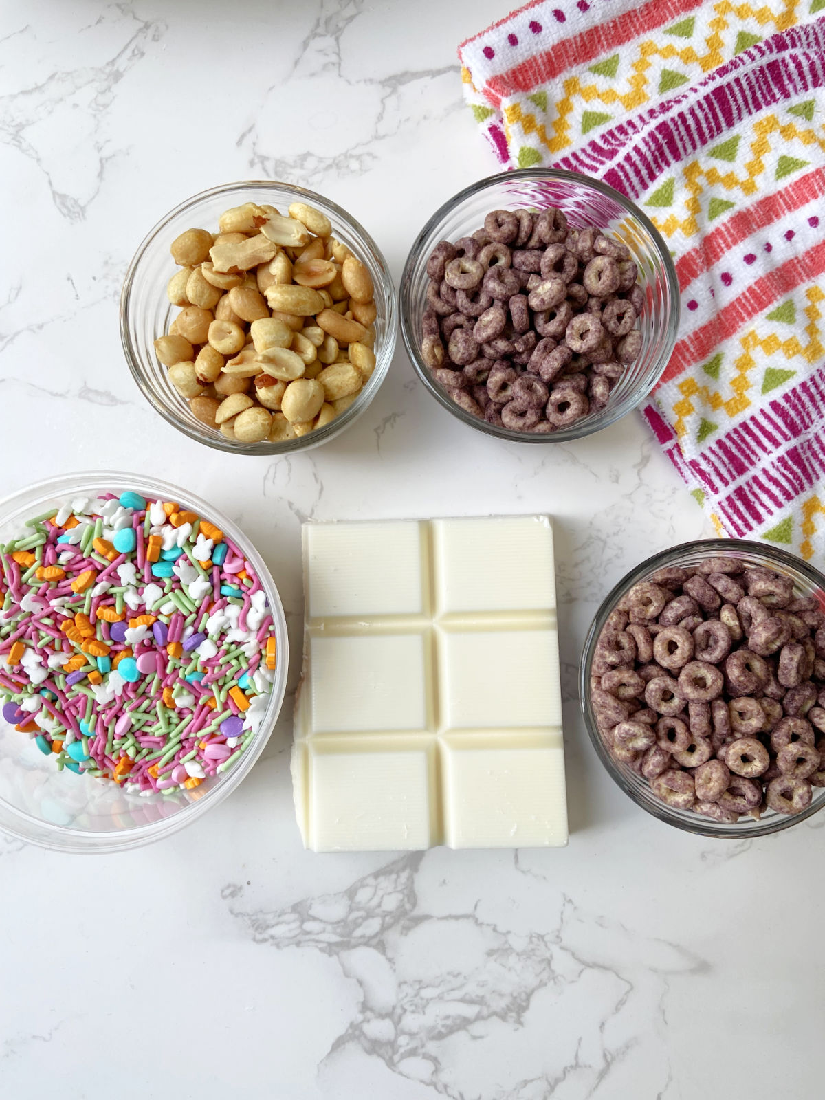 sprinkles, cheerios, peanuts and almond bark. 