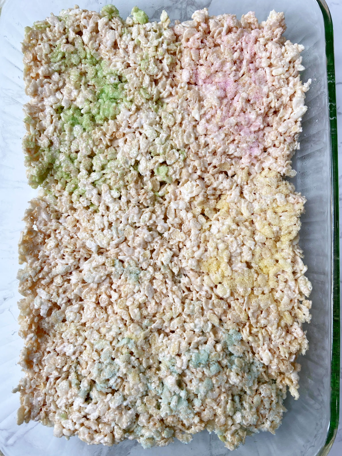 Colored Rice Krispies in a 9x13 pan. 