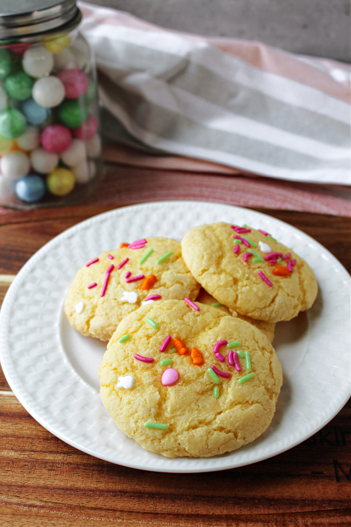 Gooey Easter Cookies on a white plate with a towel. 