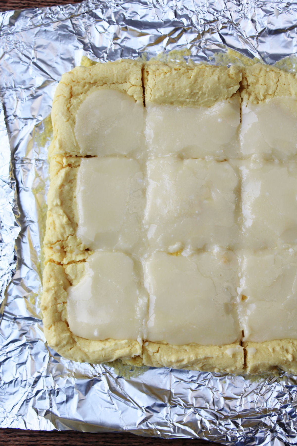 Lemon brownies covered in frosting. 