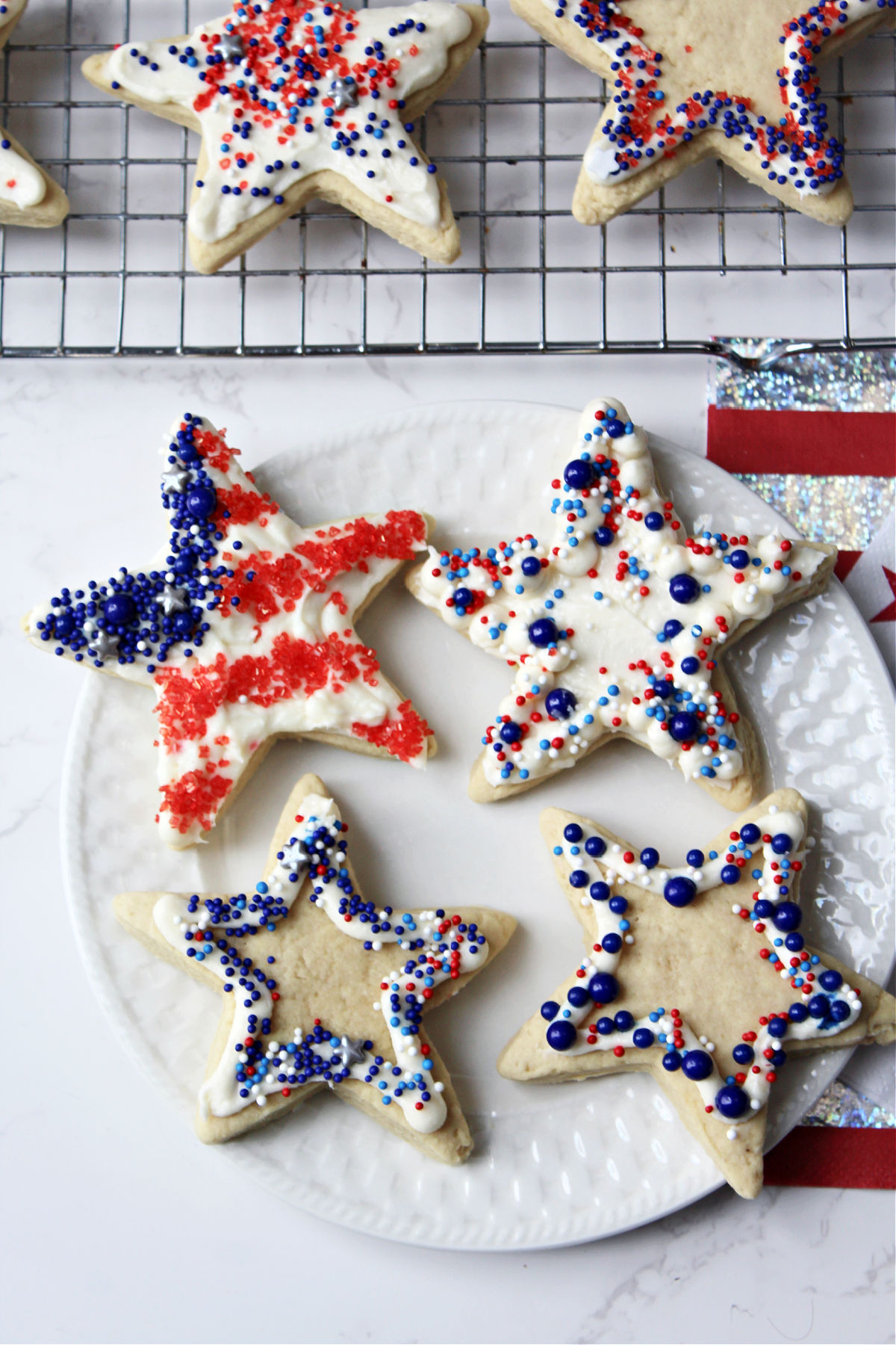 star cookies on a white plate.