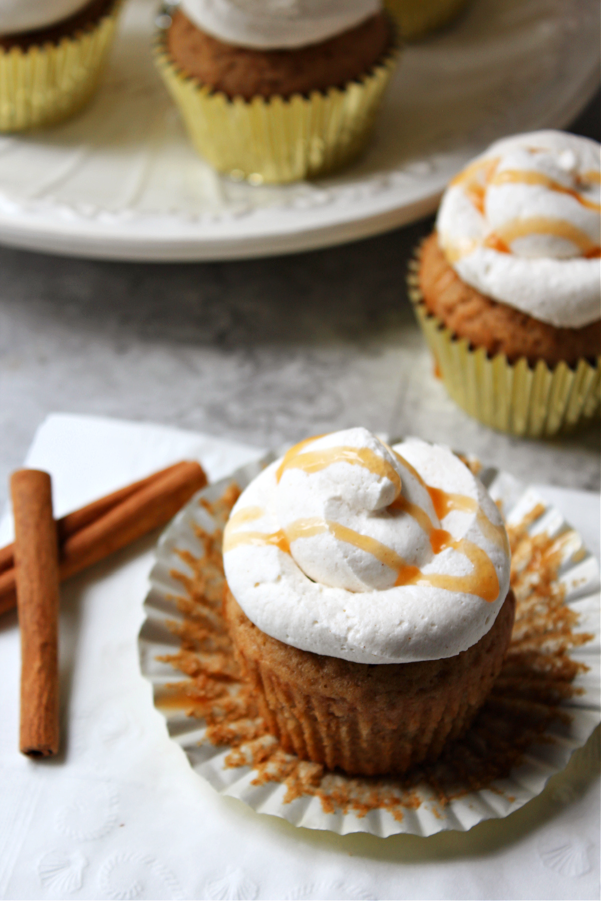 apple cider cupcakes on a napkin.