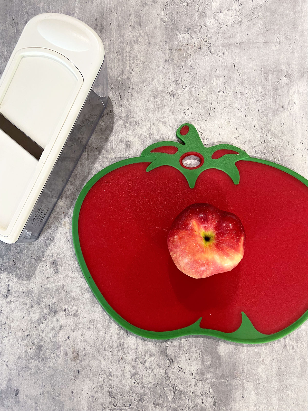 Apple on a cutting board. 