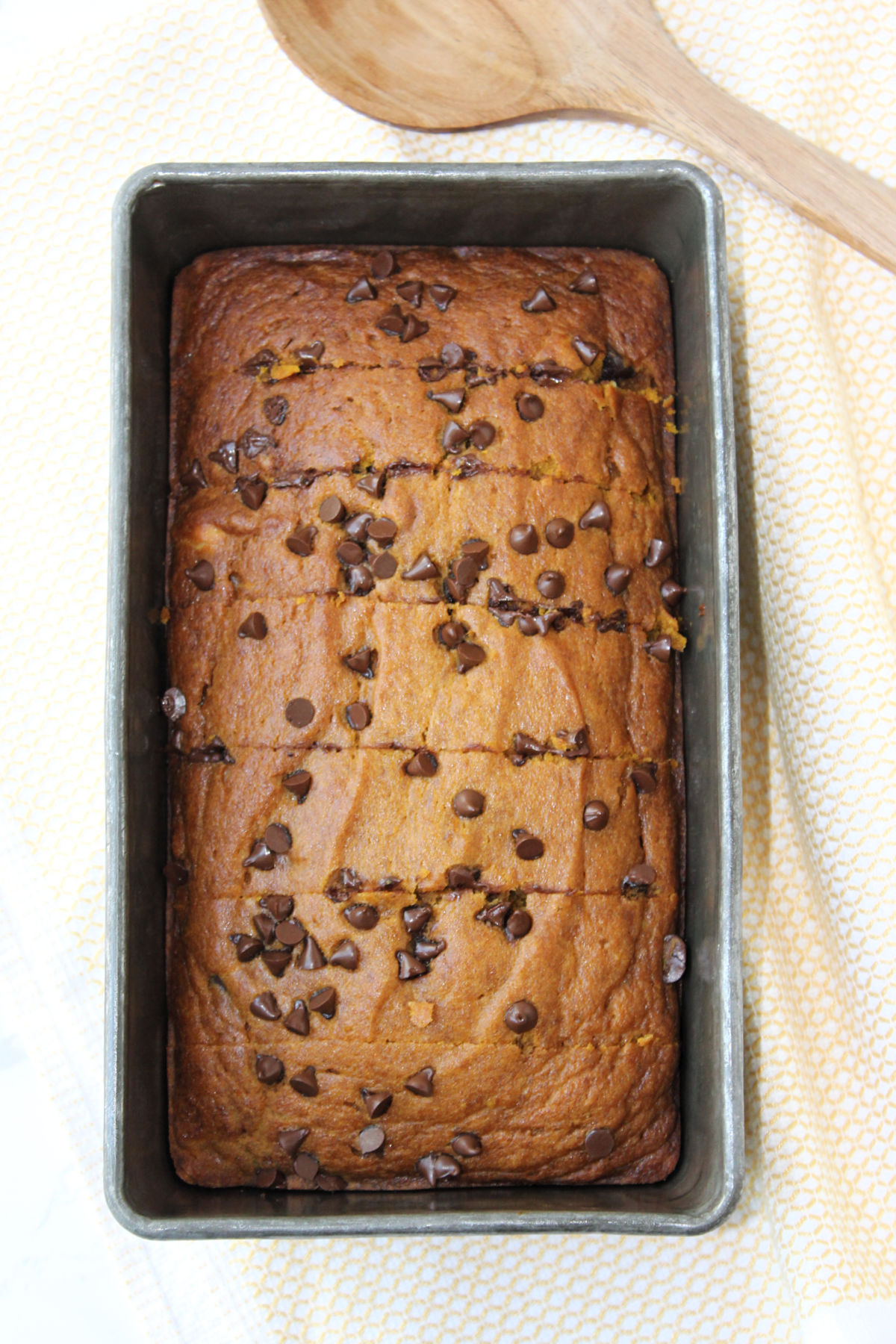 chocolate chip pumpkin bread in a loaf pan. 