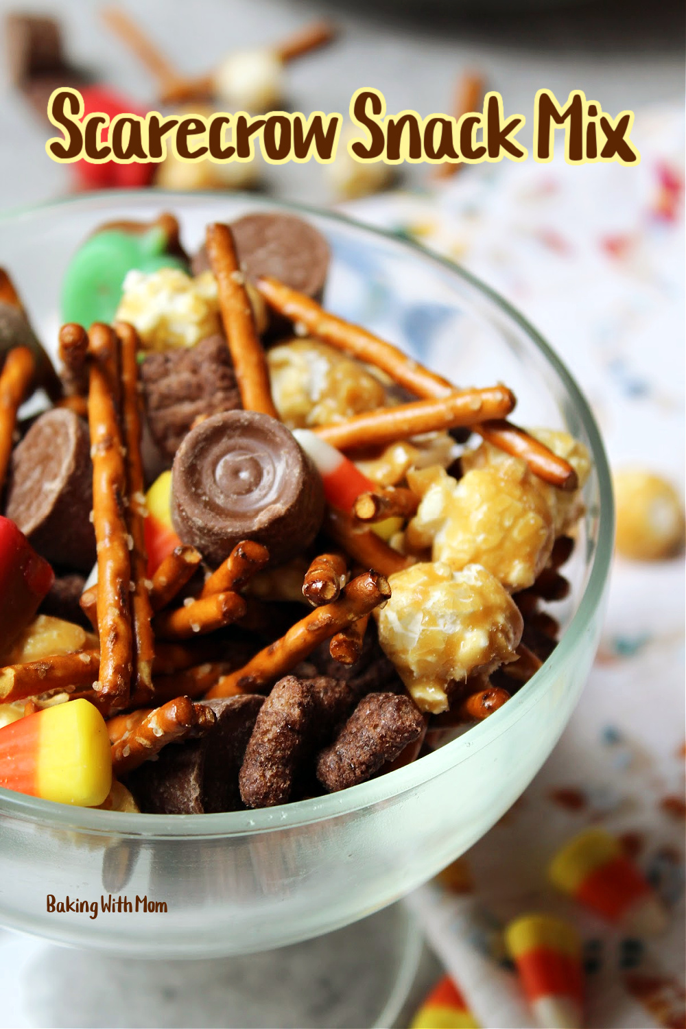 scarecrow snack mix in a clear bowl. 