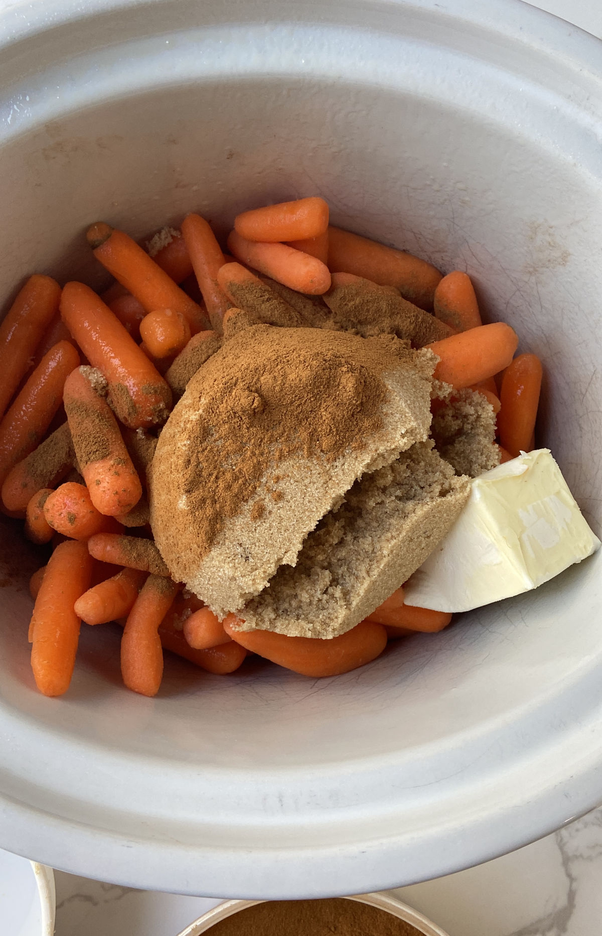 carrots in a crock pot with brown sugar and butter. 