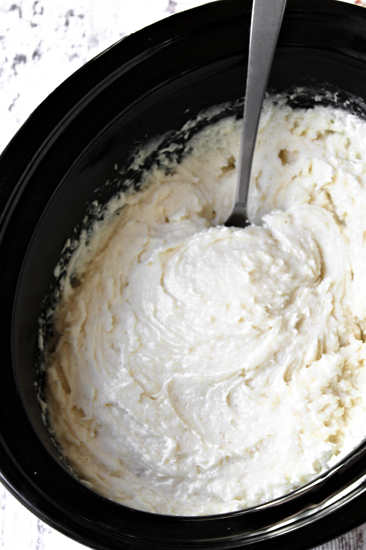 creamy mashed potatoes in a crock pot.