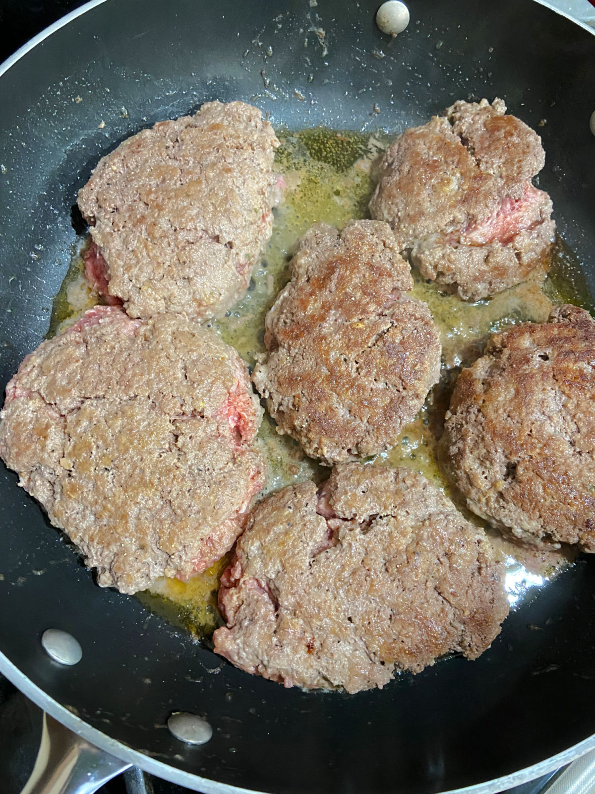 patties in a pan. 